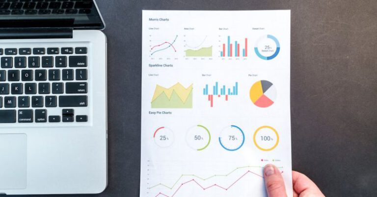 Data Analytics - Person Holding Chart And Bar Graph