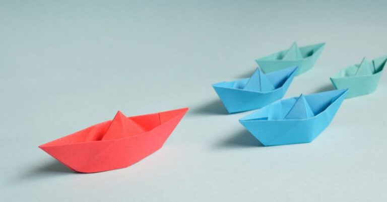 Leadership - Paper Boats on Solid Surface