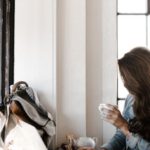 Workspaces - Woman in Gray Jacket Sitting Beside Desk